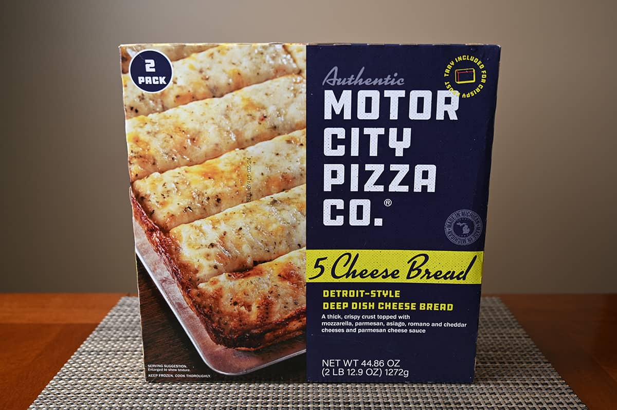 Image of the Costco Motor City Pizza Co. 5 Cheese Bread box sitting on a table unopened.