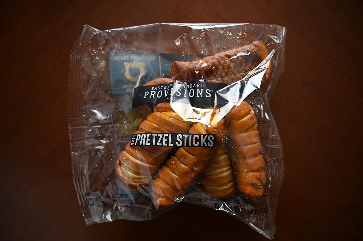 Image of the turnbuckle stick pretzels in their plastic packaging unoepened on a table.