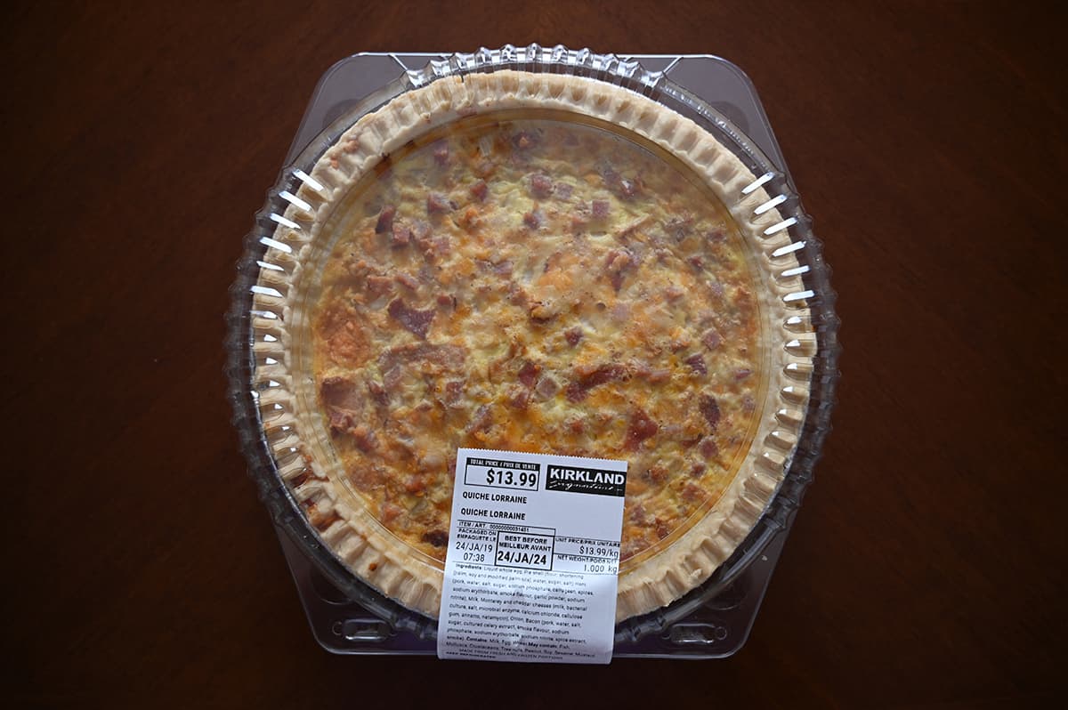 Top down image of the Costco Kirkland Signature Quiche Lorraine unopened sitting on a table.