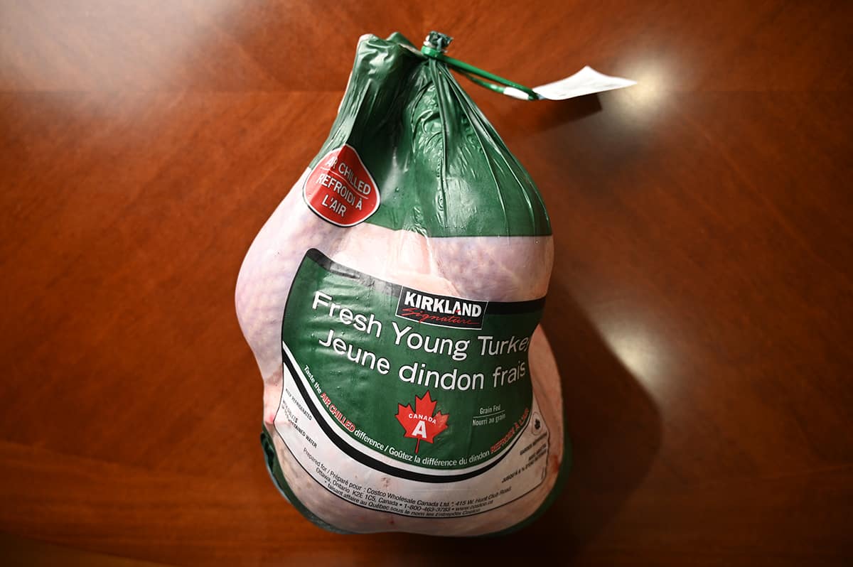 Image of the Costco Kirkland Signature Fresh Turkey in the package sitting on a table unopened.