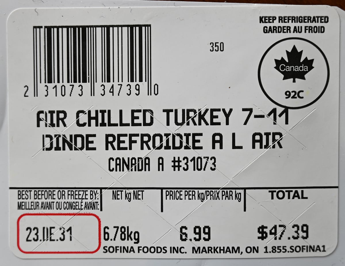 Close up image of the front label on the turkey showing cost per weight and that it's from Canada.