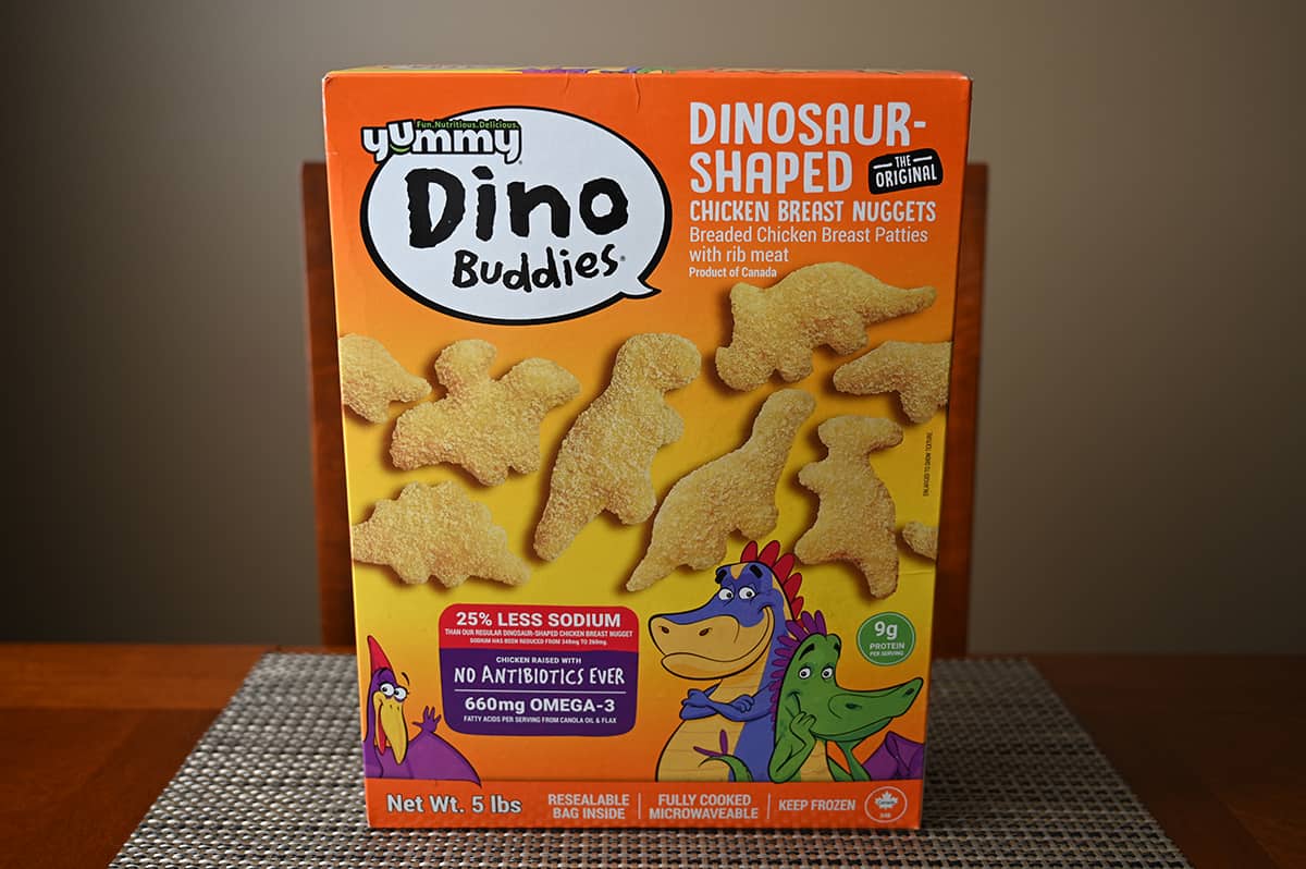 Costco Yummy Dino Buddies Chicken Nuggets box sitting on a table unopened.