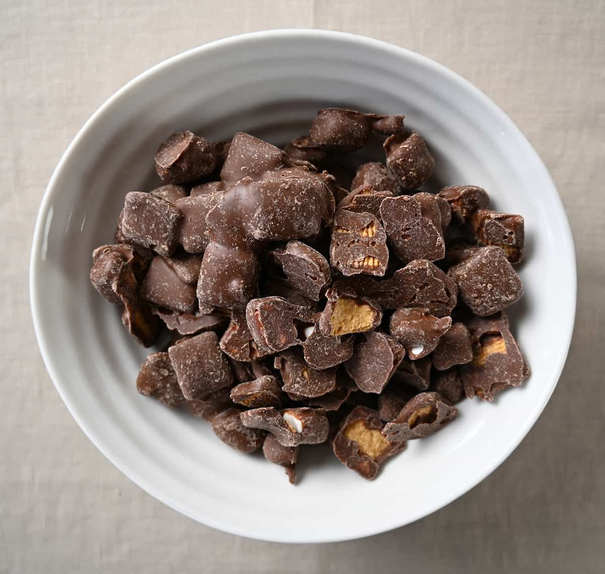 Closeup top down image of a bowl of s'mores mix. 