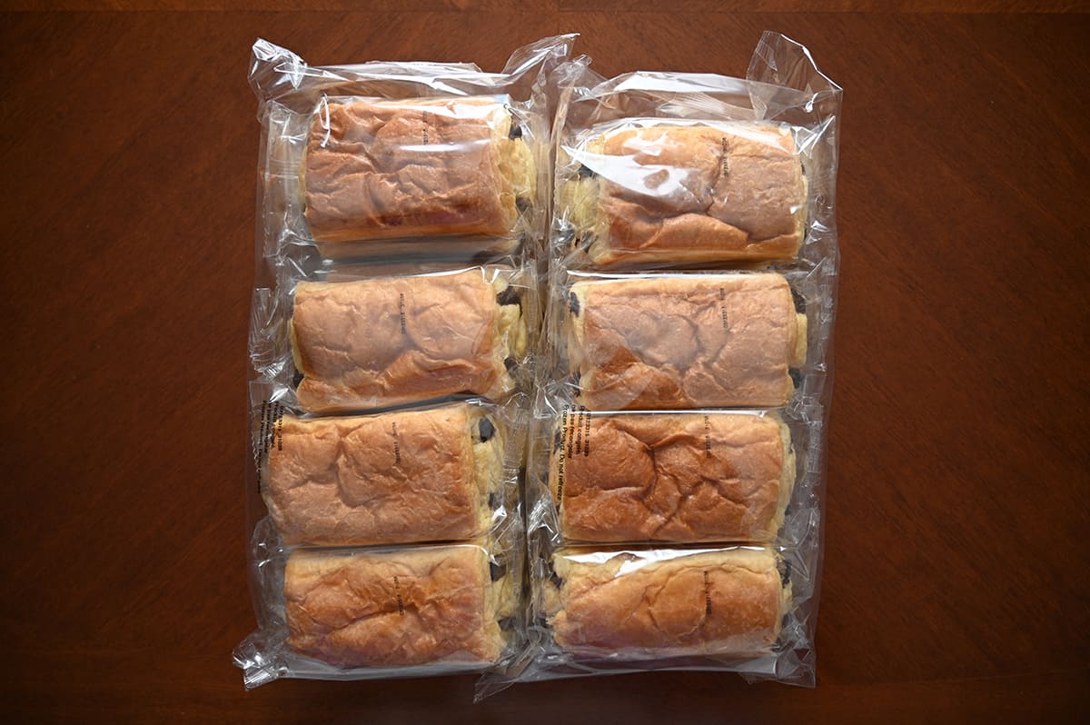 Top down image of eight individually packaged chocolatines sitting on a table.