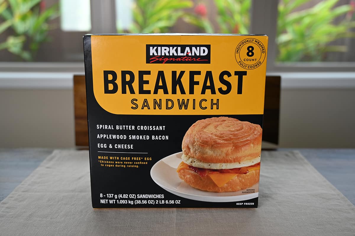 Image of the Costco Kirkland Signature Breakfast Sandwich box sitting on a table unopened.