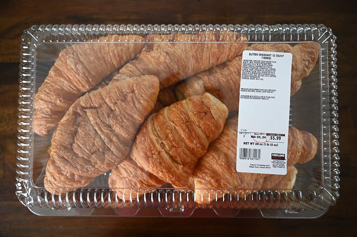 Image of the Kirkland Signature Butter Croissant container unopened sitting on a table.