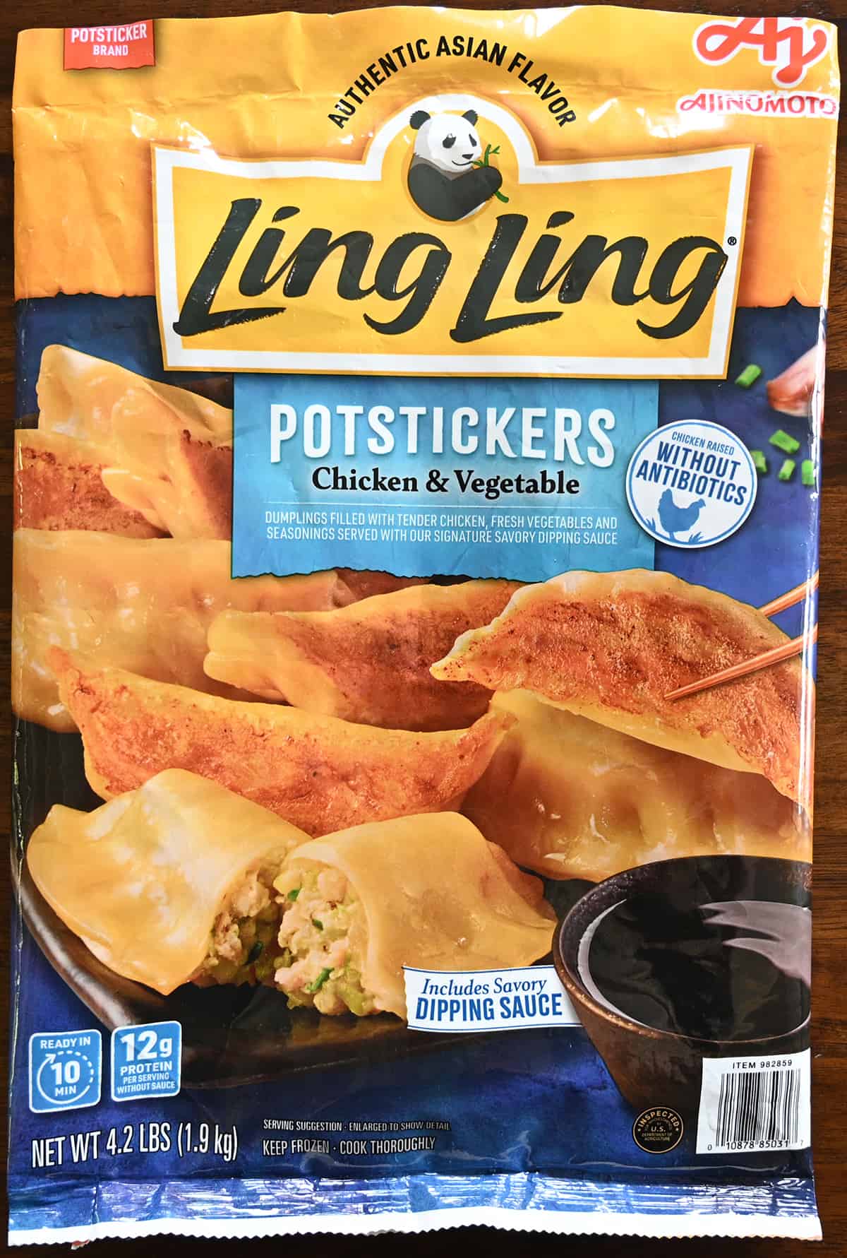 Closeup image of the front of the bag of potstickers showing size of the bag and that they're made with chicken raised without antibiotics.
