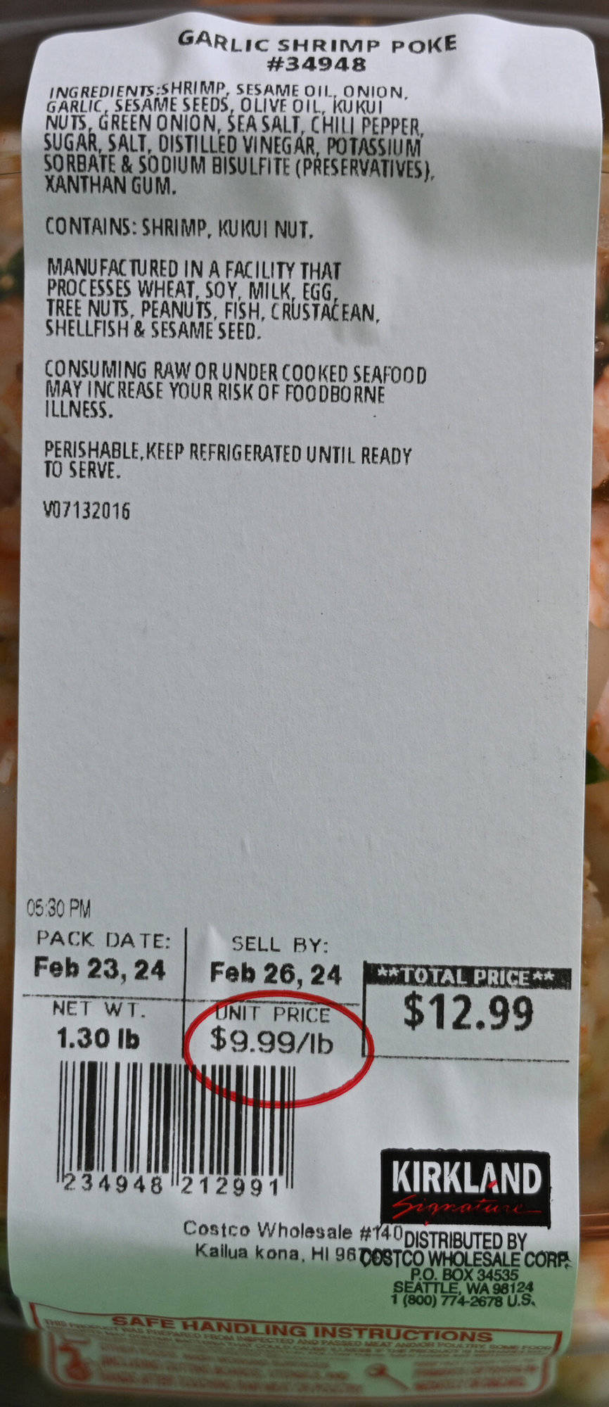 Closeup image of the front label of the Garlic Shrimp Poke showing the best before date and cost.