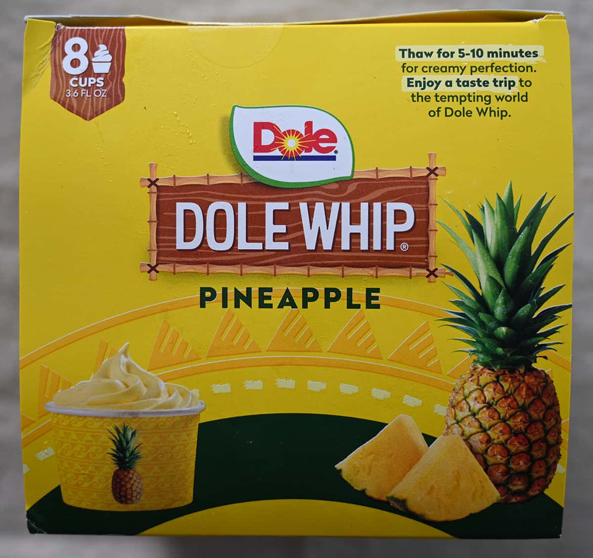 Side view image of the Dole Whip box showing how to serve the whip and that there are 8 cups in the box.