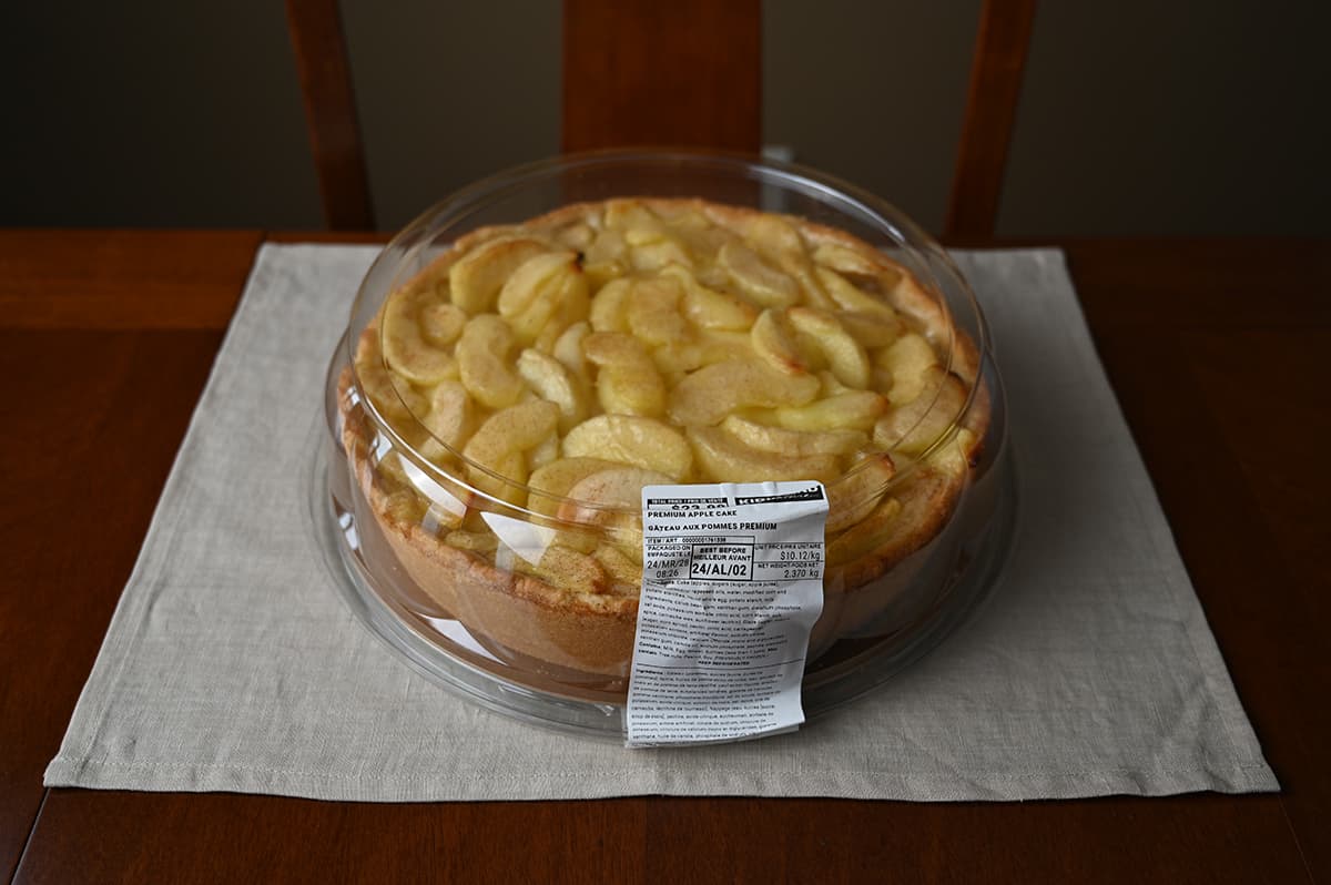 Top down image of the Costco Kirkland Signature Premium Apple Cake sitting on a table unopened. 