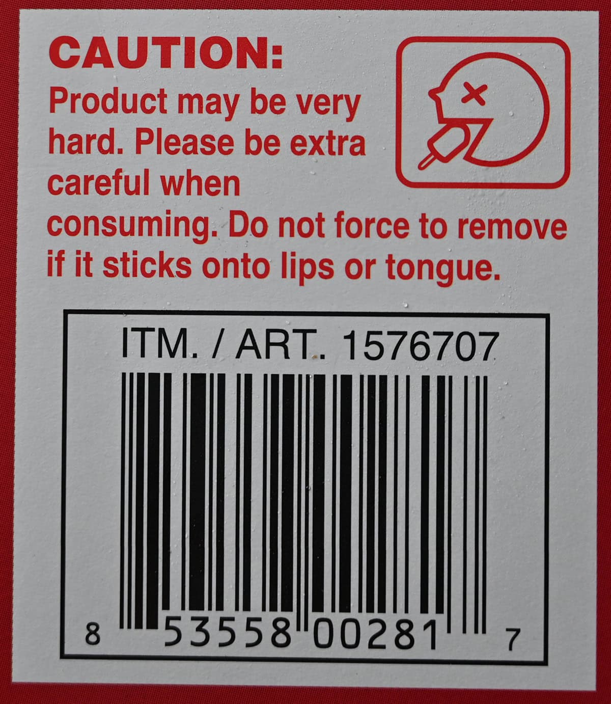 Image of a warning on the box of frozen dessert bars saying not to forcefully remove lips or tongue if it sticks to the bar. 