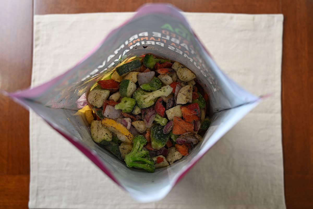 Top down image of the open bag of frozen vegetables showing what the vegetables look like in the bag.