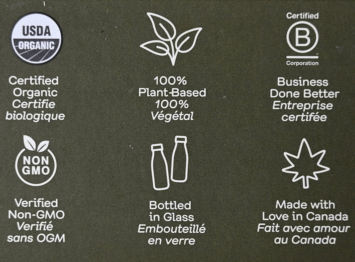 Image of the back of the box of ginger defence showing the health benefits like it's Non-GMO and plant-based.