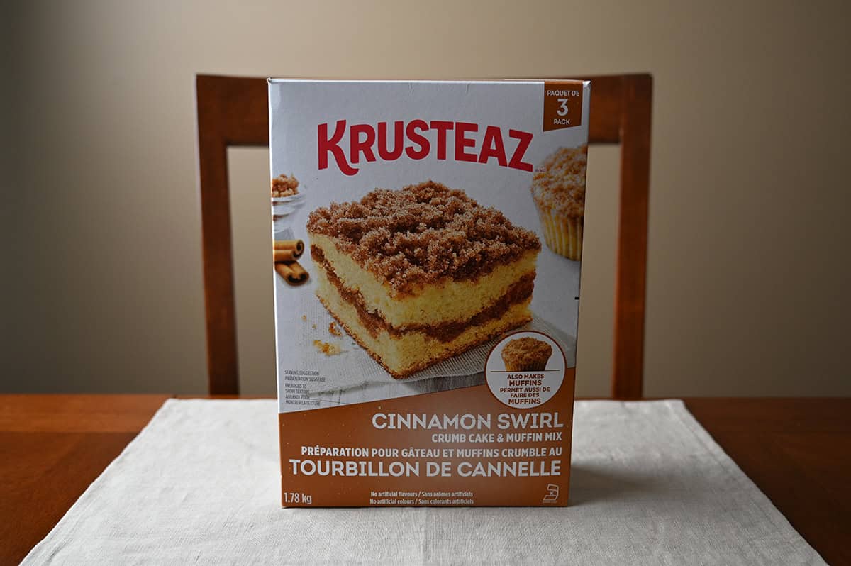 Sideview image of the Costco Krusteaz Cinnamon Swirl Crumb Cake & Muffin Mix box sitting on a table.