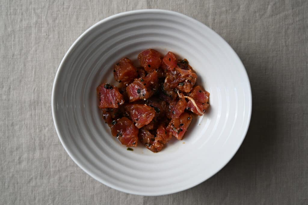 Top down close up image of a bowl of tuna poke. 