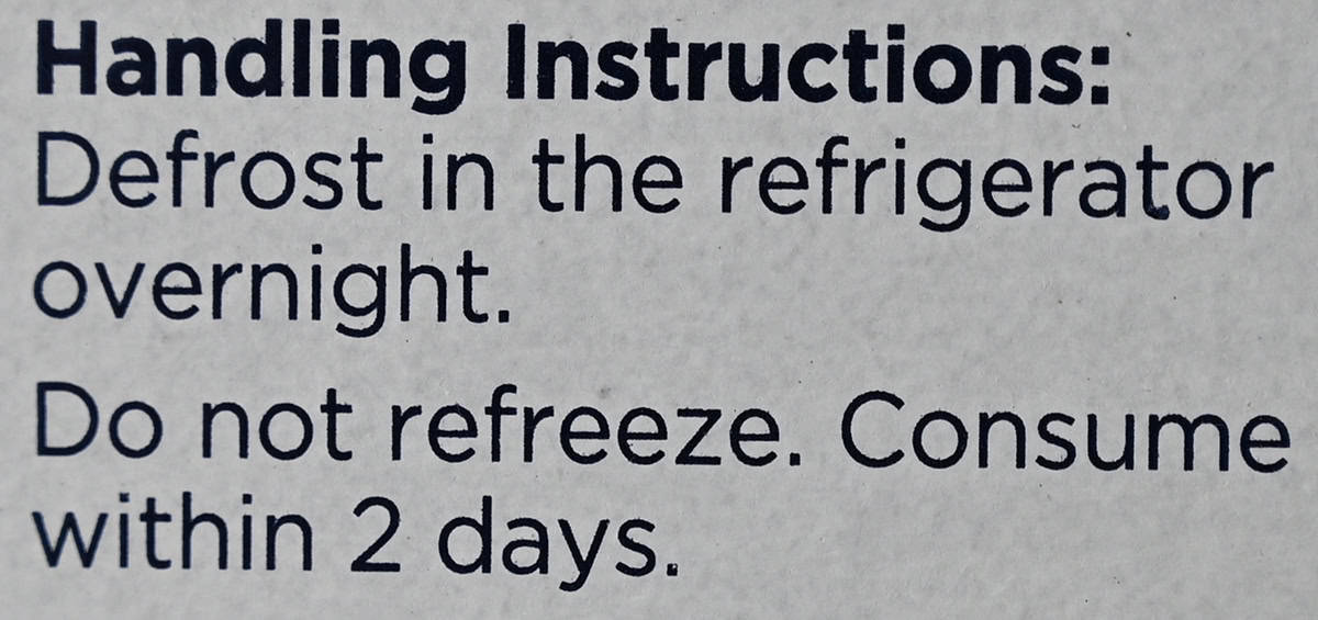 Image of the handling instructions for the poke from the back of the box.