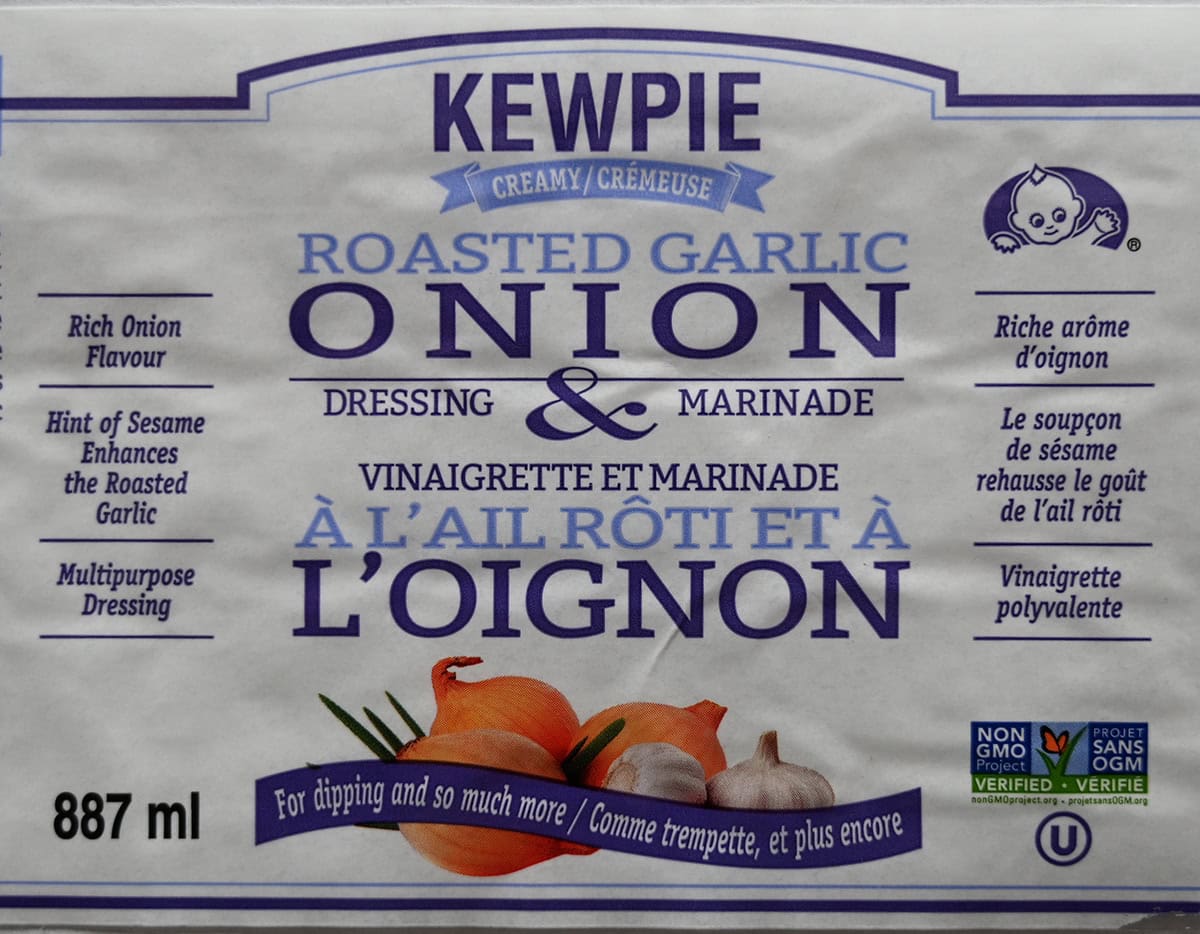 Closeup image of the front label on the salad dressing & marinade showing that it's a multipurpose dressing and Non-GMO certified.