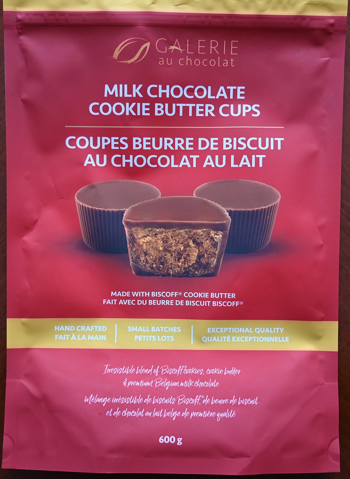 Closeup image of the front of the cookie butter cups bag showing that they're hand crafted and made in small batches.