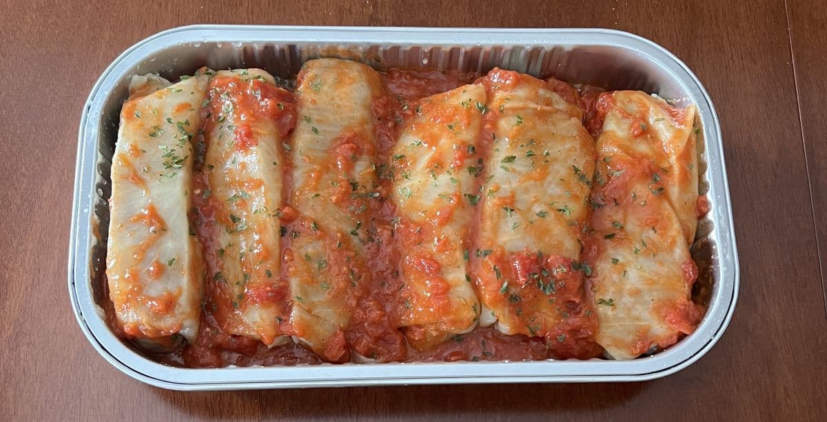 Image of the cabbage rolls in the tray with the lid off after cooking them.