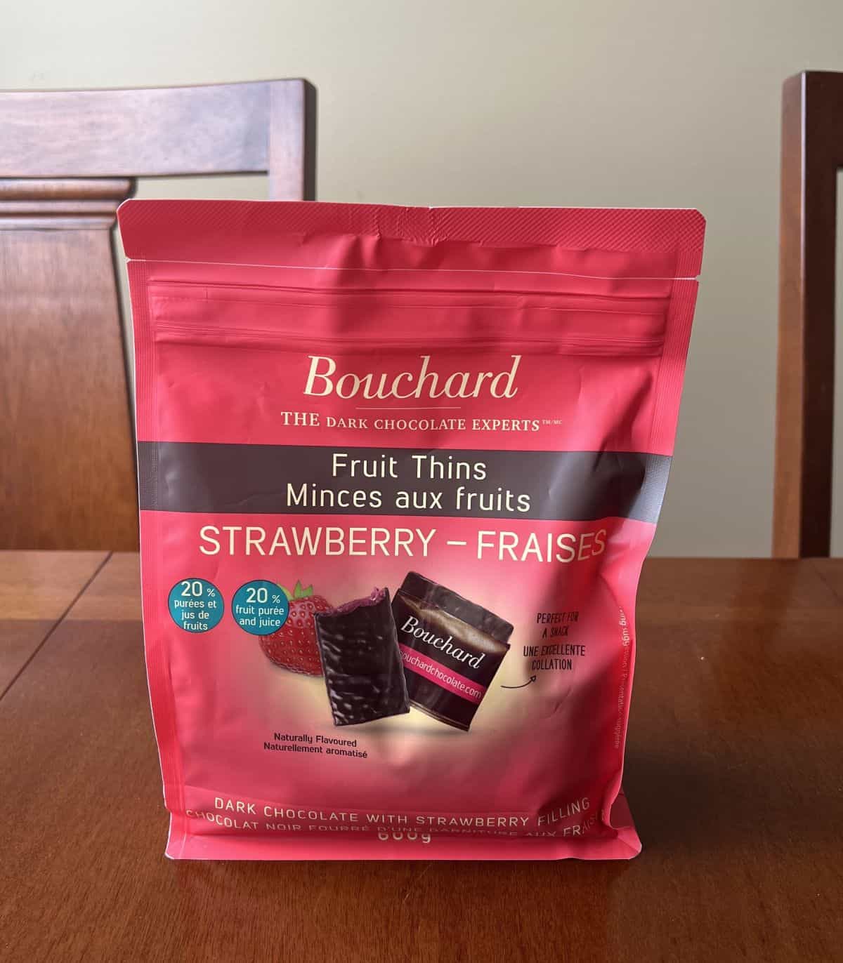 Image of the Costco Bouchard Fruit Thins bag sitting on a table unopened.