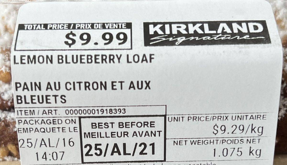 Image of the front label on the loaf from the package showing the cost and best before date.