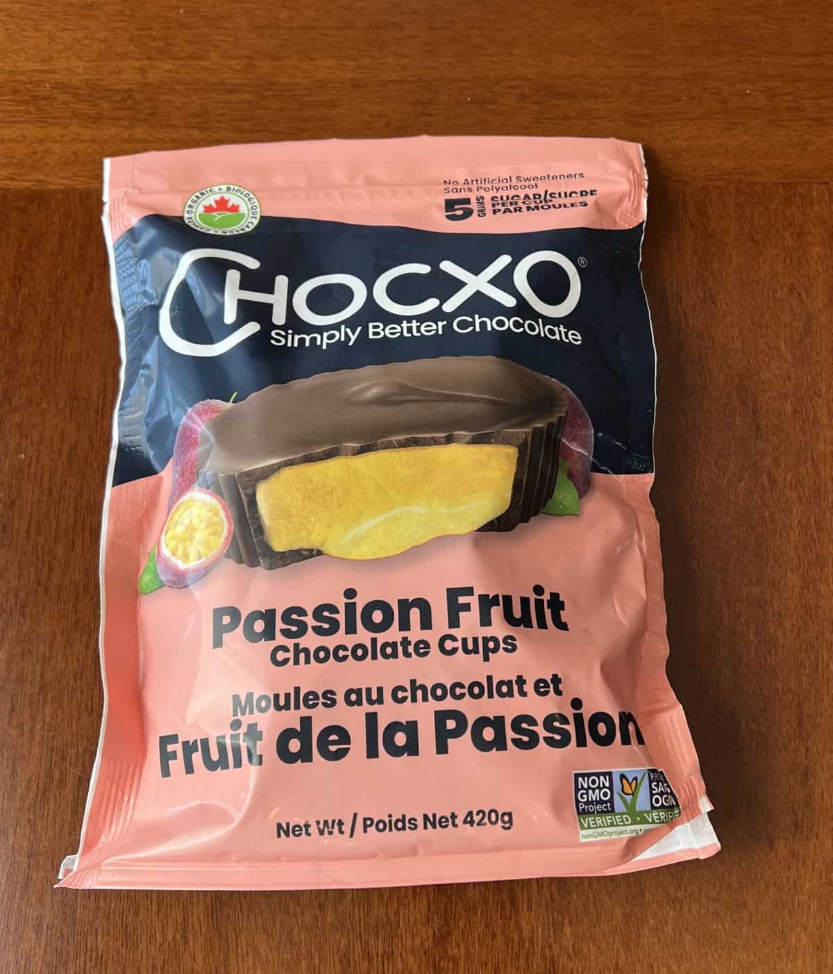 Image of the bag of Costco Chocxo Passion Fruit Chocolate Cups sitting on a table unopened. 