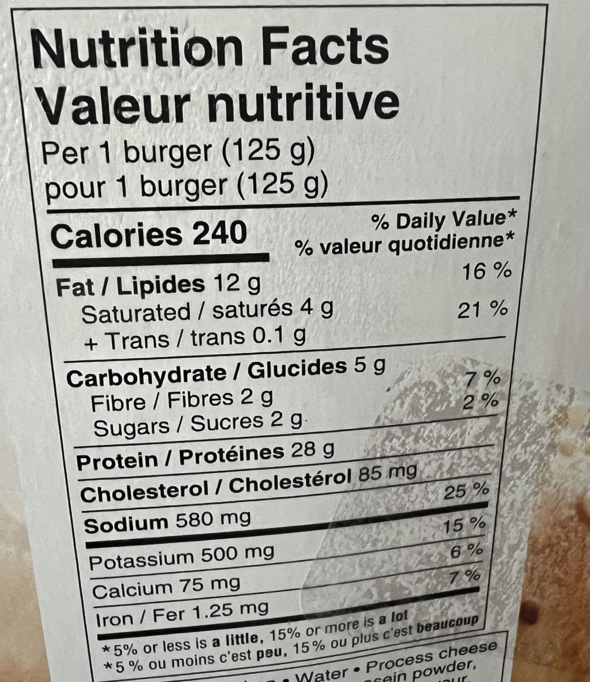Image of the nutrition facts for the caramelized onion & cheese chicken burgers. 