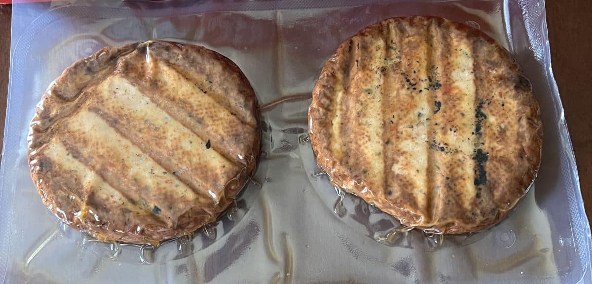 Image of the Connie's Kitchen Roasted Red Pepper Chicken Burgers sealed in packs of two. 