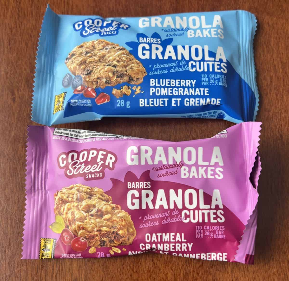 Top down image of two granola bakes in their package sitting on a table unopened.