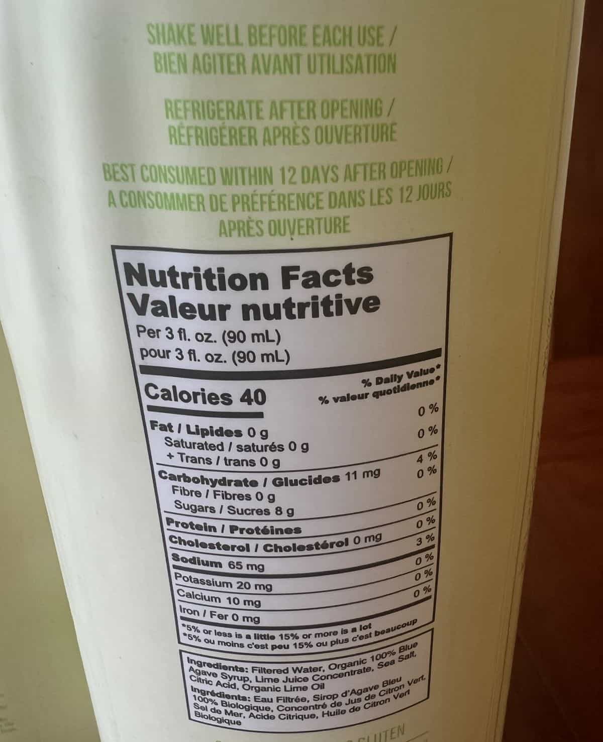 Image of nutrition facts for the margarita mix and ingredients from the back of the bottle.