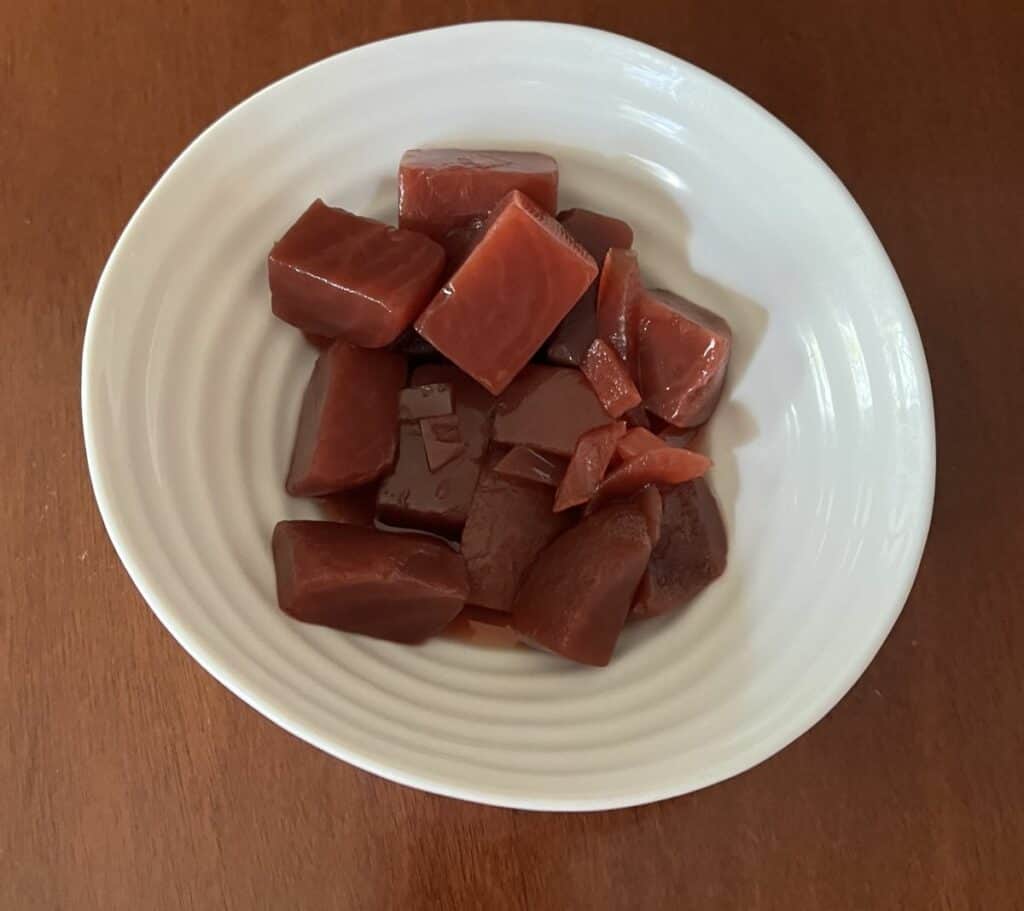 Top down image of a bowl of Costco Paisley Farm Beet & Onion Salad. 