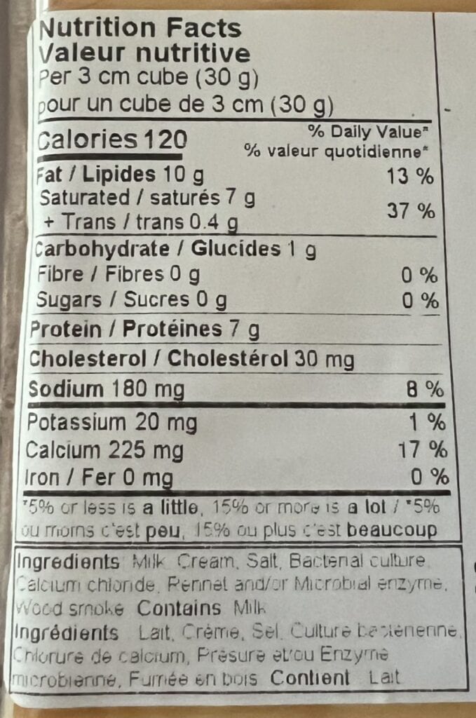 Image of the nutrition facts and ingredients list from the back of the block of cheese. 