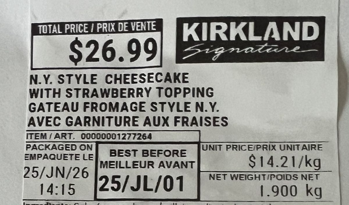 Image of the front label on the cheesecake showing the cost, ingredients and best before date.