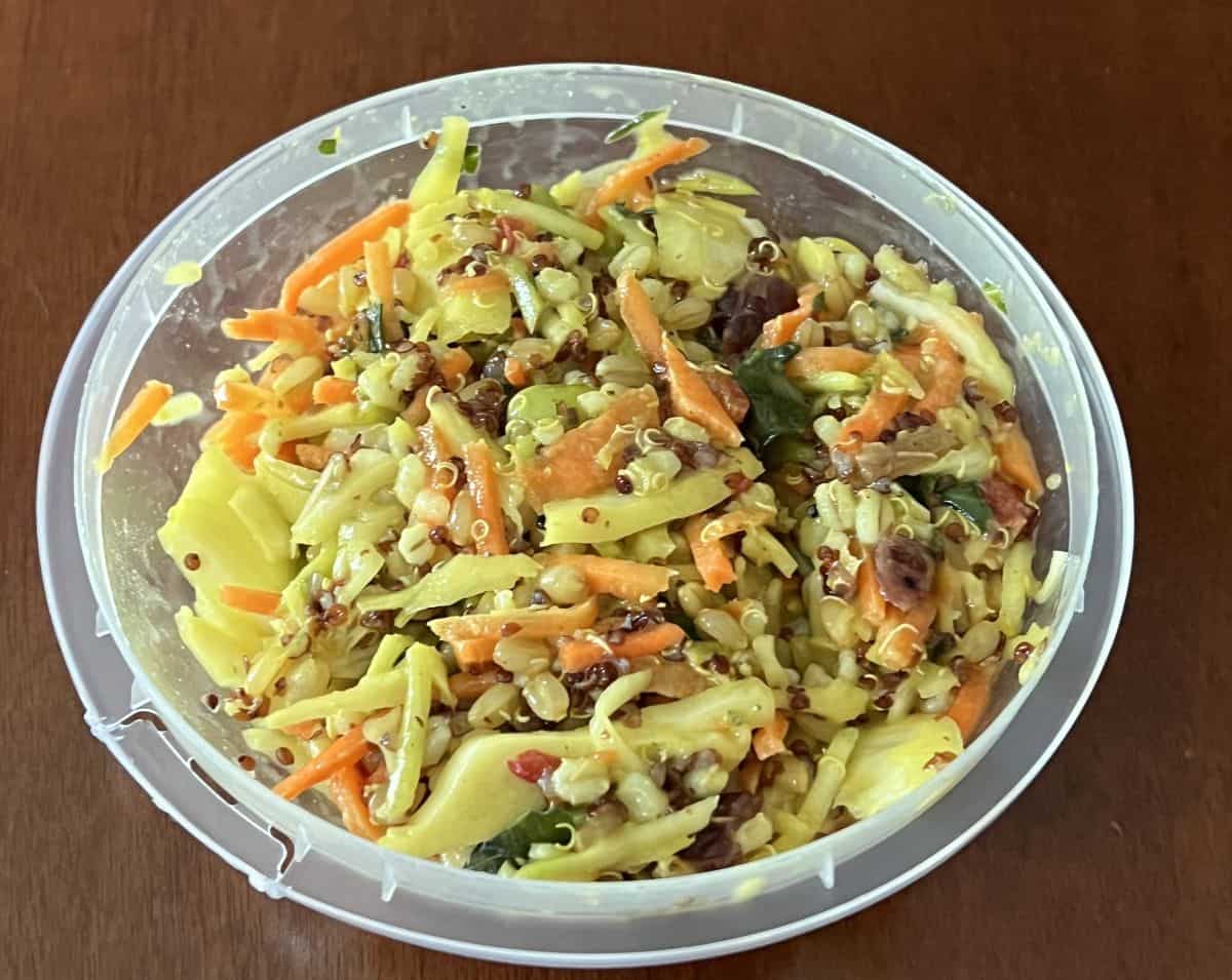 Top down image of an open container of the crunchy grain salad.