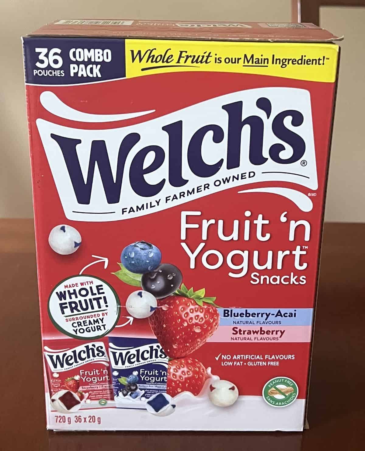 Image of the Costco Welch's Fruit 'n Yogurt Snacks box sitting on a table unopened.