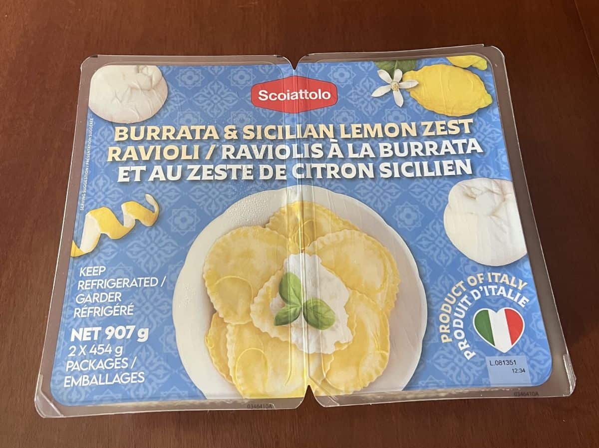 Image of the Costco Scoiattolo Burrata & Sicilian Lemon Zest Ravioli package sitting on a table unopened.
