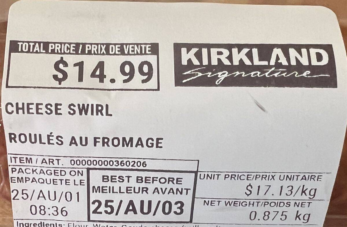 Closeup image of the front label on the Kirkland Signature Cheese Swirl showing the cost and best before date. 