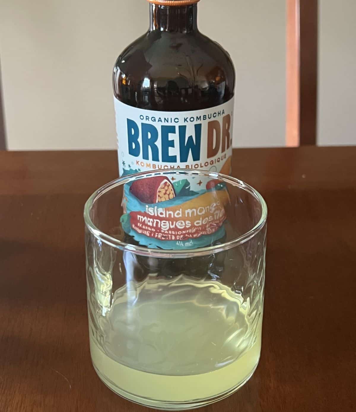 Image of a glass of Island Mango kombucha.