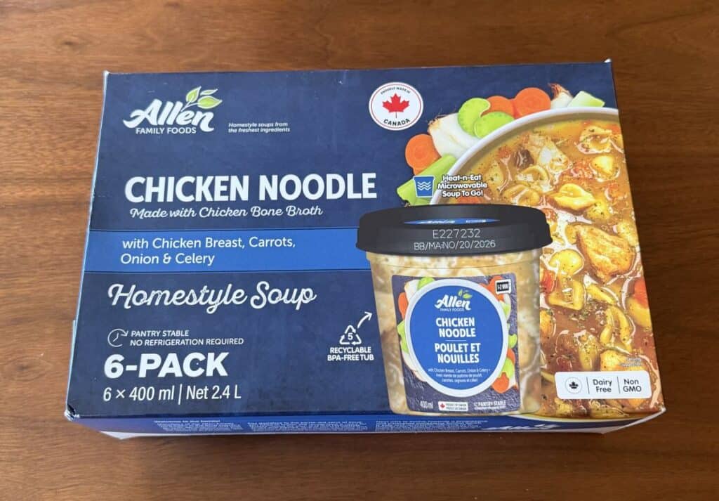 Costco Allen Family Foods Chicken Noodle Soup box sitting on a table unopened.