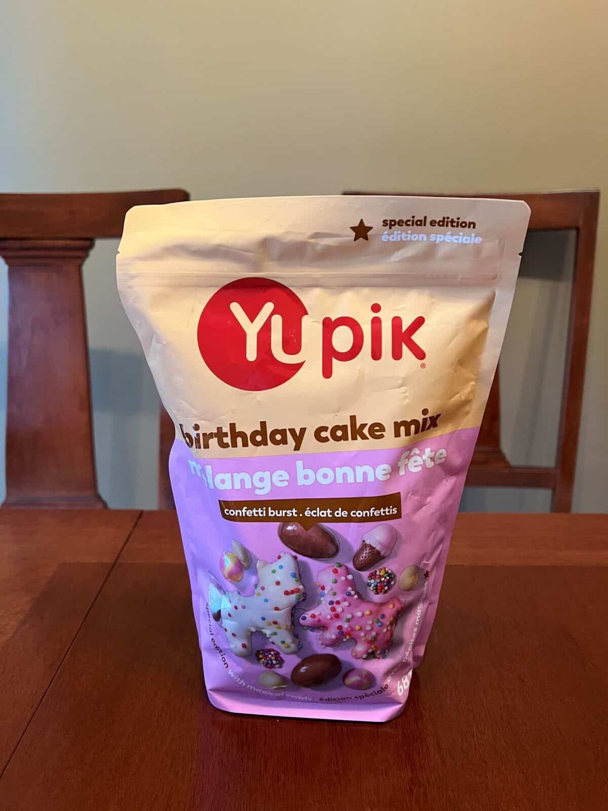 Image of the Costco Yupik Birthday Cake Mix bag sitting on a table unopened.