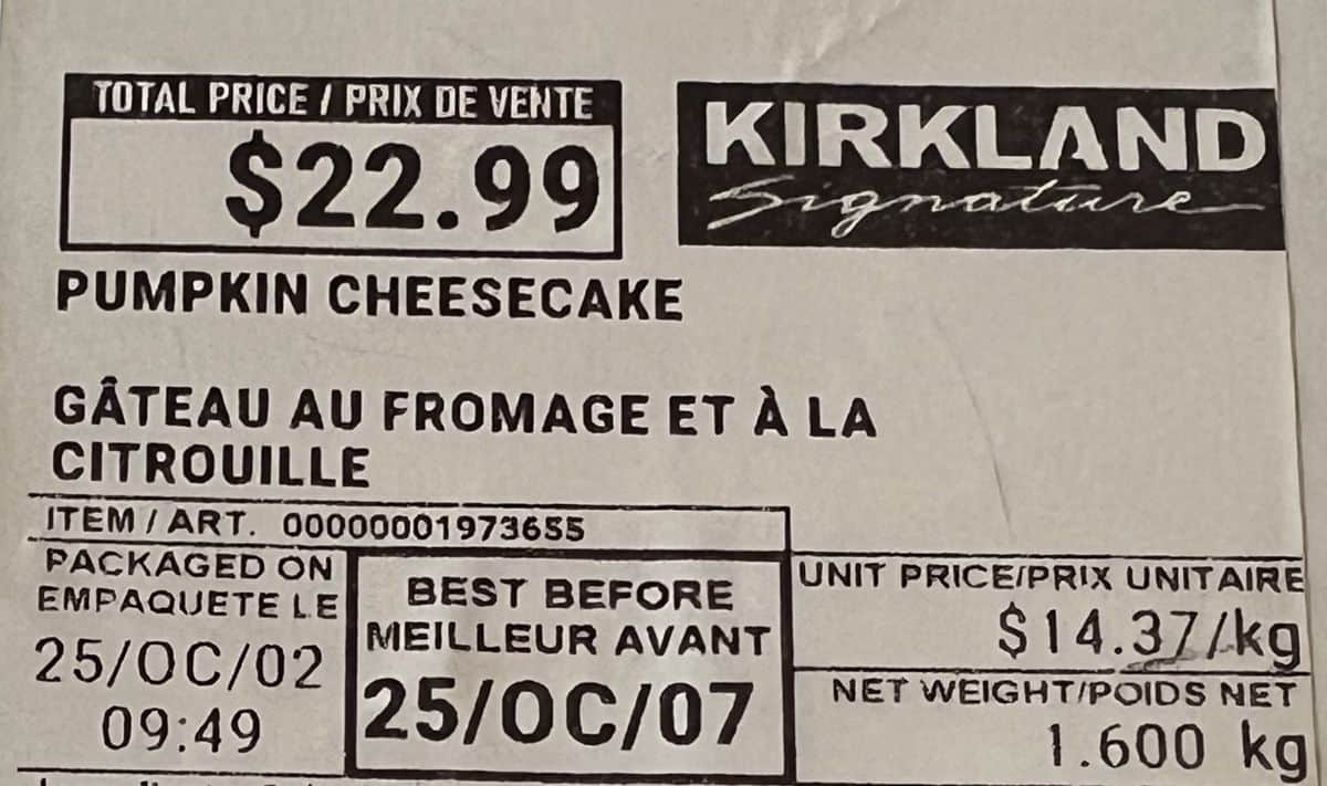 Closeup image of the label on the cheesecake showing the price, and expiry date.