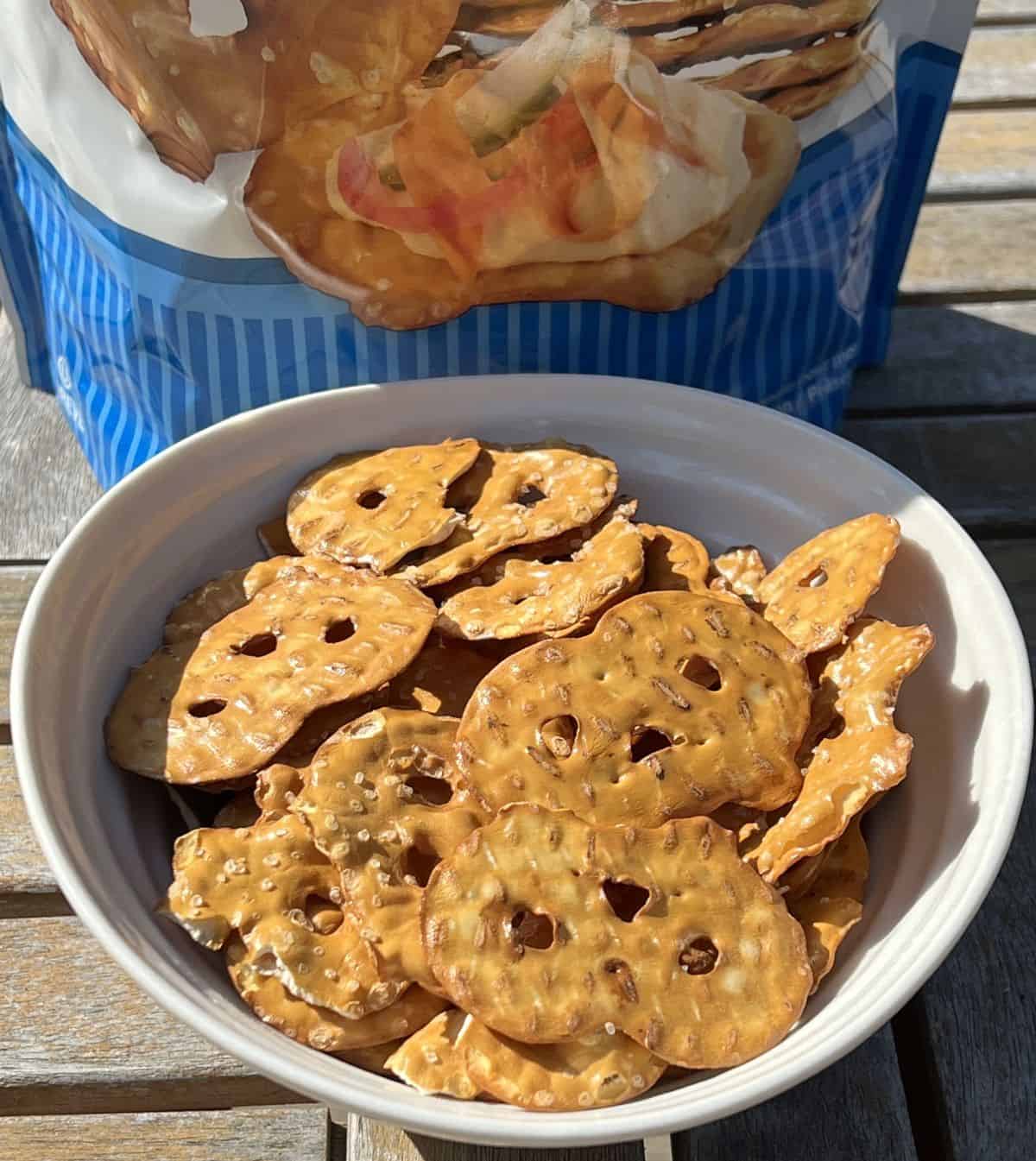 Closeup image of a bowl of pretzel crisps.