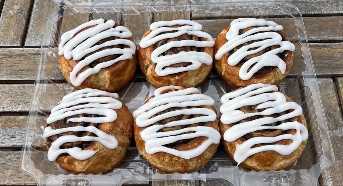 Top down image of the container of swirls open and sitting on a table.