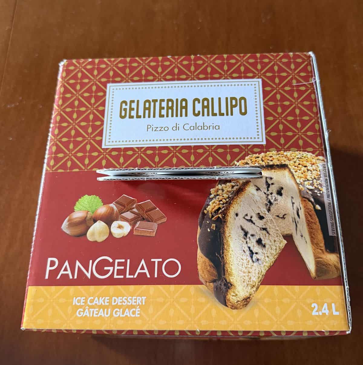 Image of the top of the box showing that it has a handle and it's 2.4 liters of cake.