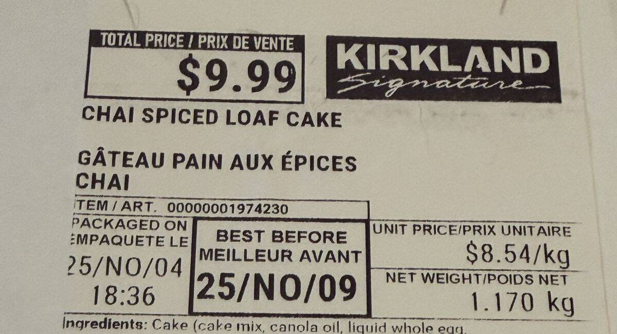 Closeup image of the front label on the Costco Kirkland Signature Chai Spiced Loaf Cake showing the cost, expiry date. 