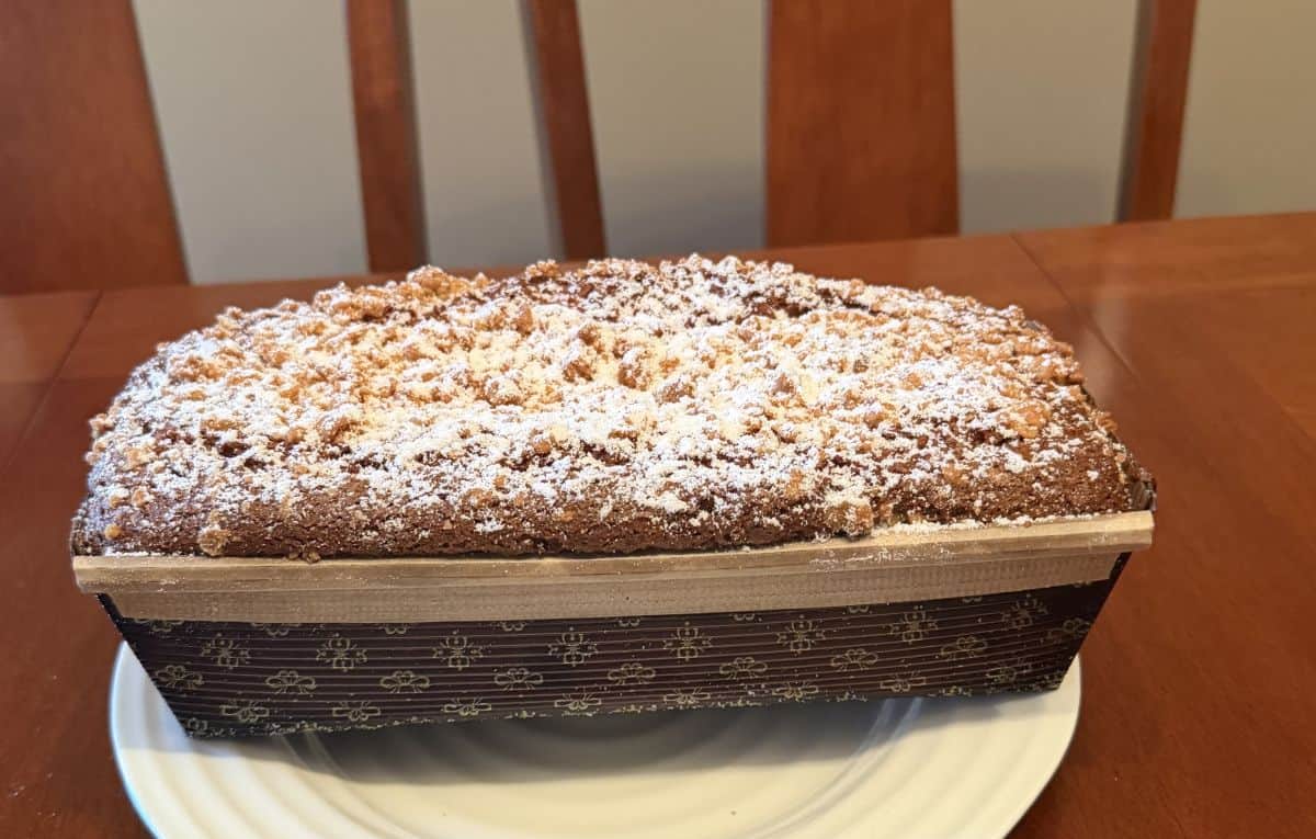 Image of the entire Costco Kirkland Signature Chai Spiced Loaf Cake sitting on a white plate.