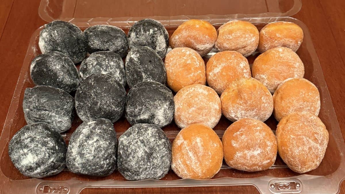 Image of an open container of the Costco Kirkland Signature Mini Filled Donuts 