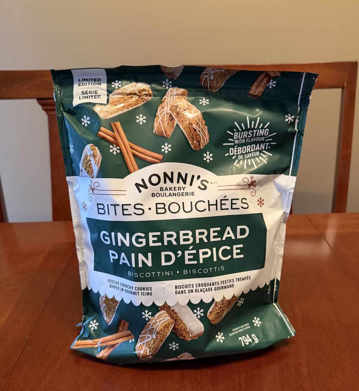 Image of the Costco Nonni's Gingerbread Biscotti Bites bag sitting on a table unopened.