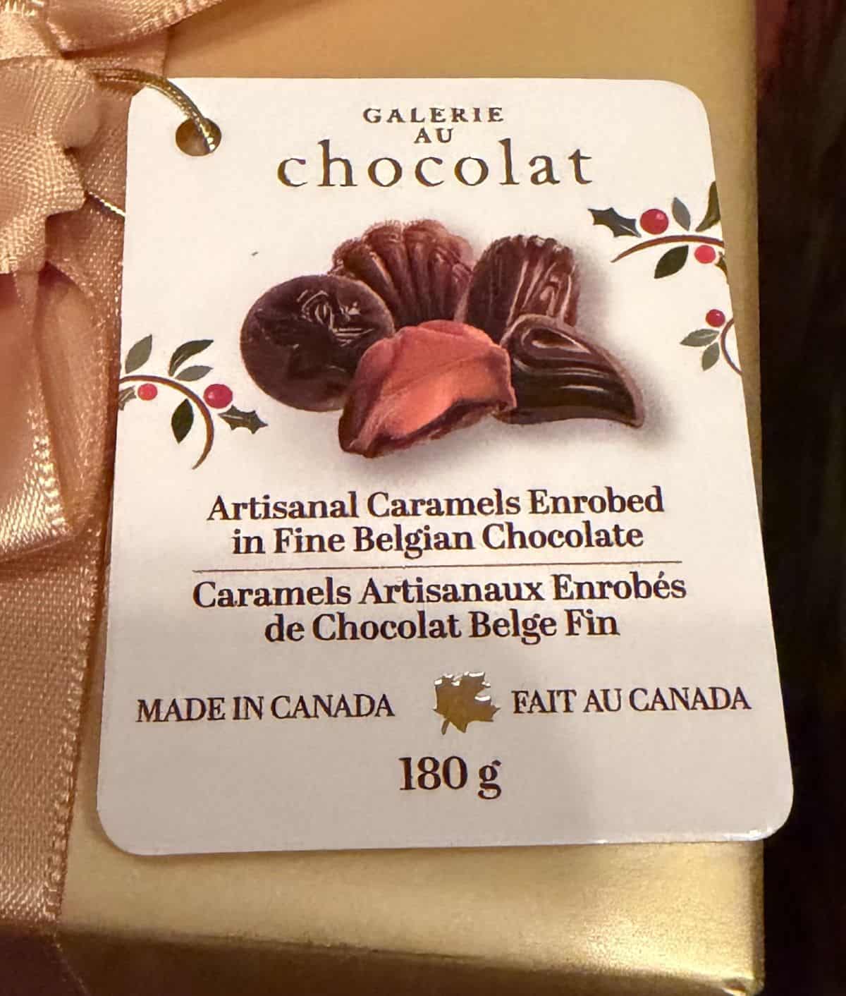 Image of the tag from the box of chocolates showing they're made in Canada. 