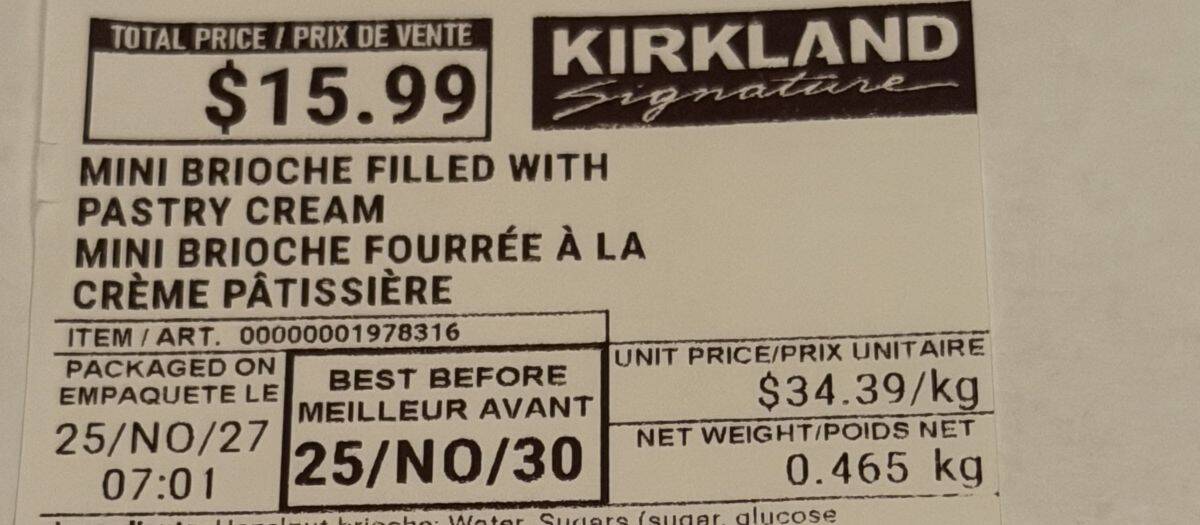 Closeup image of the front label on the Kirkland Signature Mini Brioche with Pastry Cream so you can see the cost and expiry date.